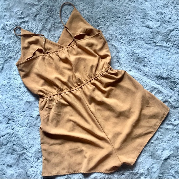 Monk and Lou romper with pockets mustard yellow from Plenty large cross front V - Picture 5 of 6